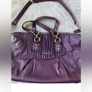 Beautiful purple color leather Coach satchel with shoulder strap